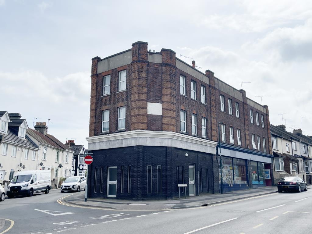 Lot: 12 - VACANT GROUND FLOOR COMMERCIAL PREMISES PLUS GROUND RENT INCOME - view of three storey building known as 1-2 Livingstone Building